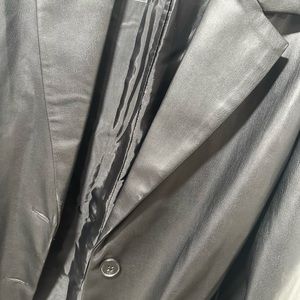 It’s a used faux leather blazer